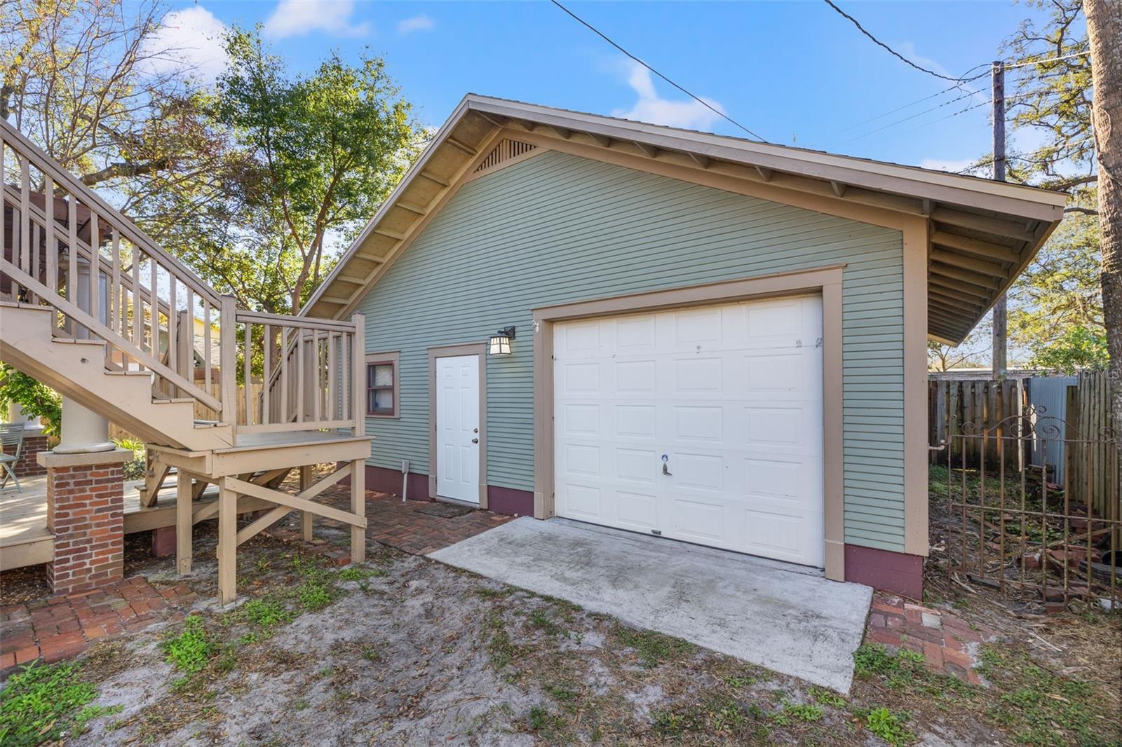 Pull through oversized garage access via backyard