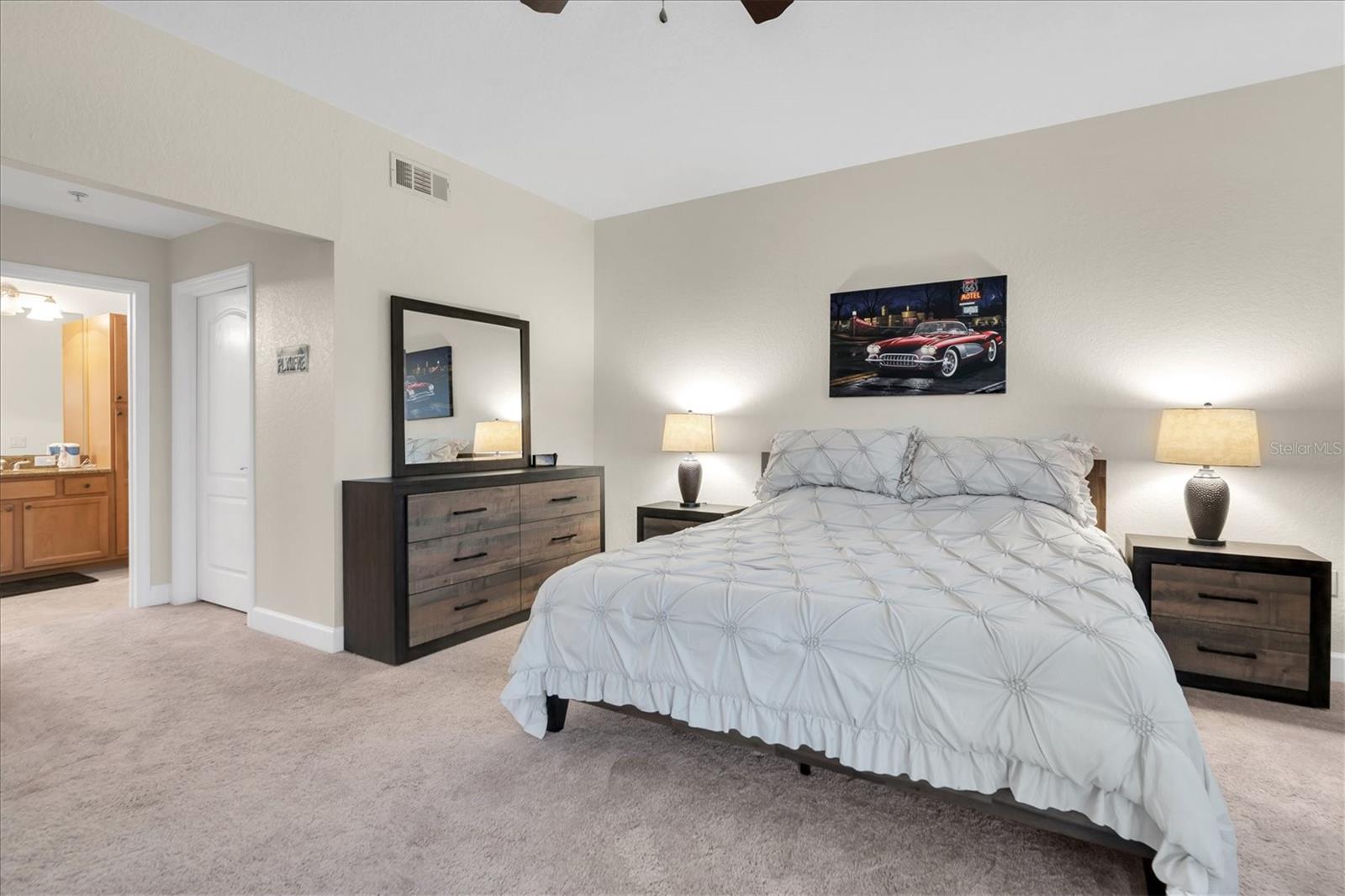 Primary suite has 2 walk-in closets and ensuite bathroom with double vanities, walk-in shower, and separate water closet.