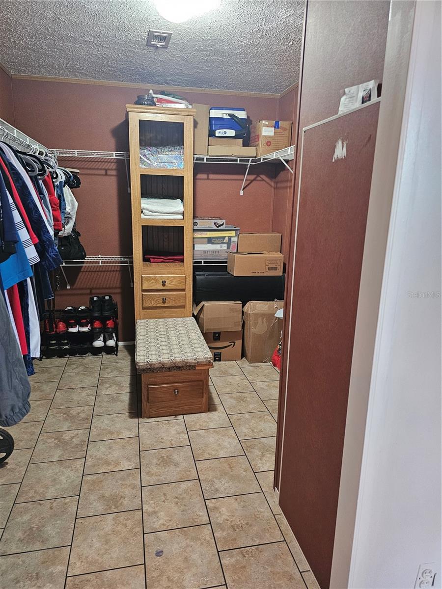 LARGE MASTER WALK IN CLOSET