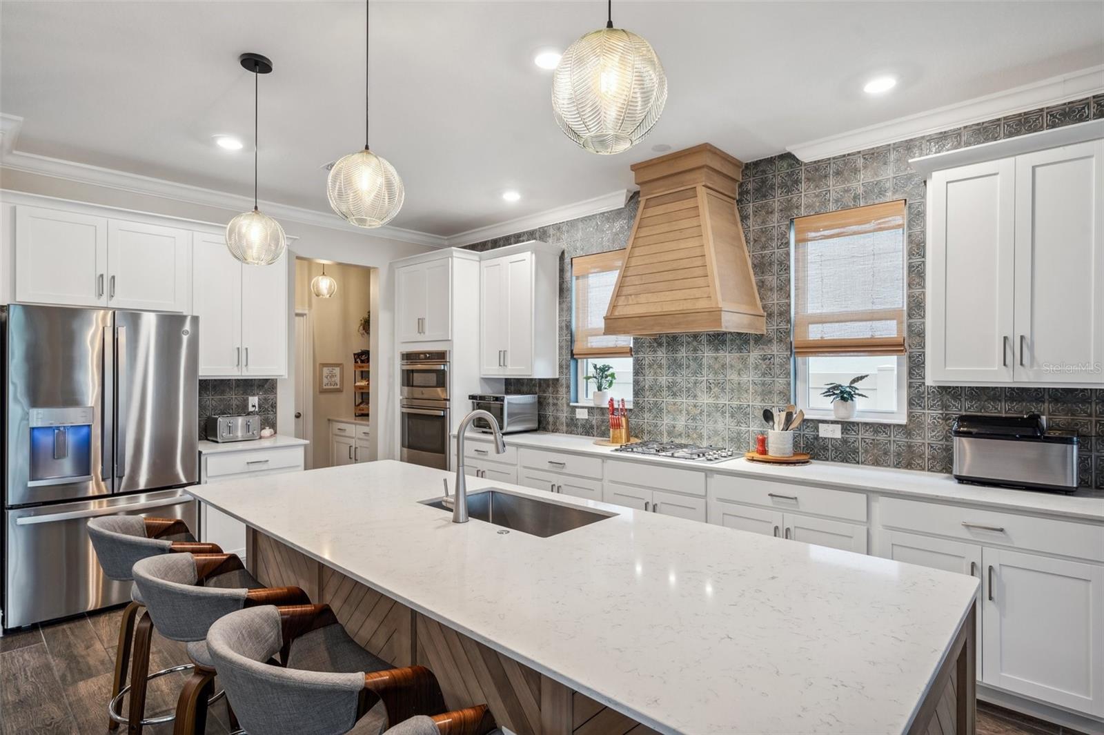 Kitchen with gas stove top and built in oven