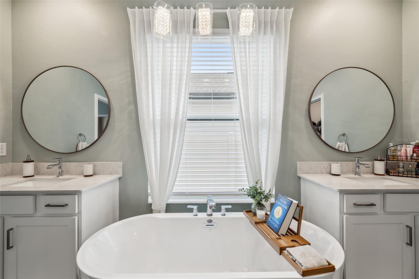 Dual Vanities and Elegant soaker tub