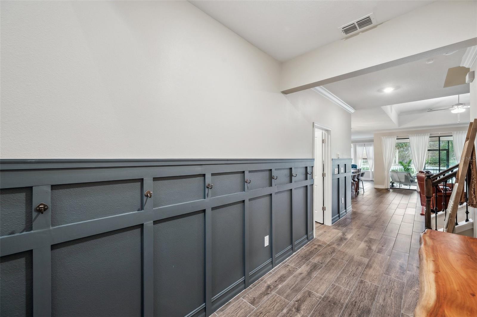 Custom board and batten in entry hallway