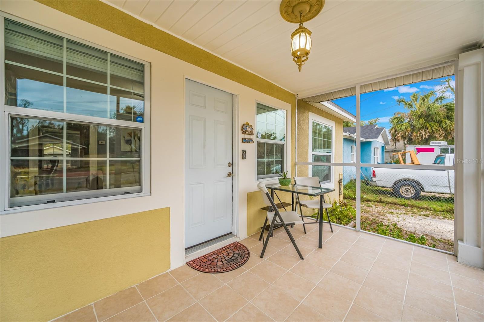 Inviting Screened Front Porch