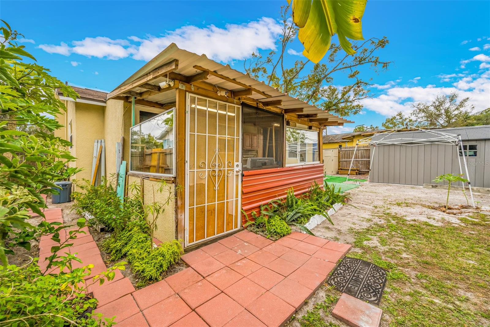 Large, Fenced Backyard with Storage Shed