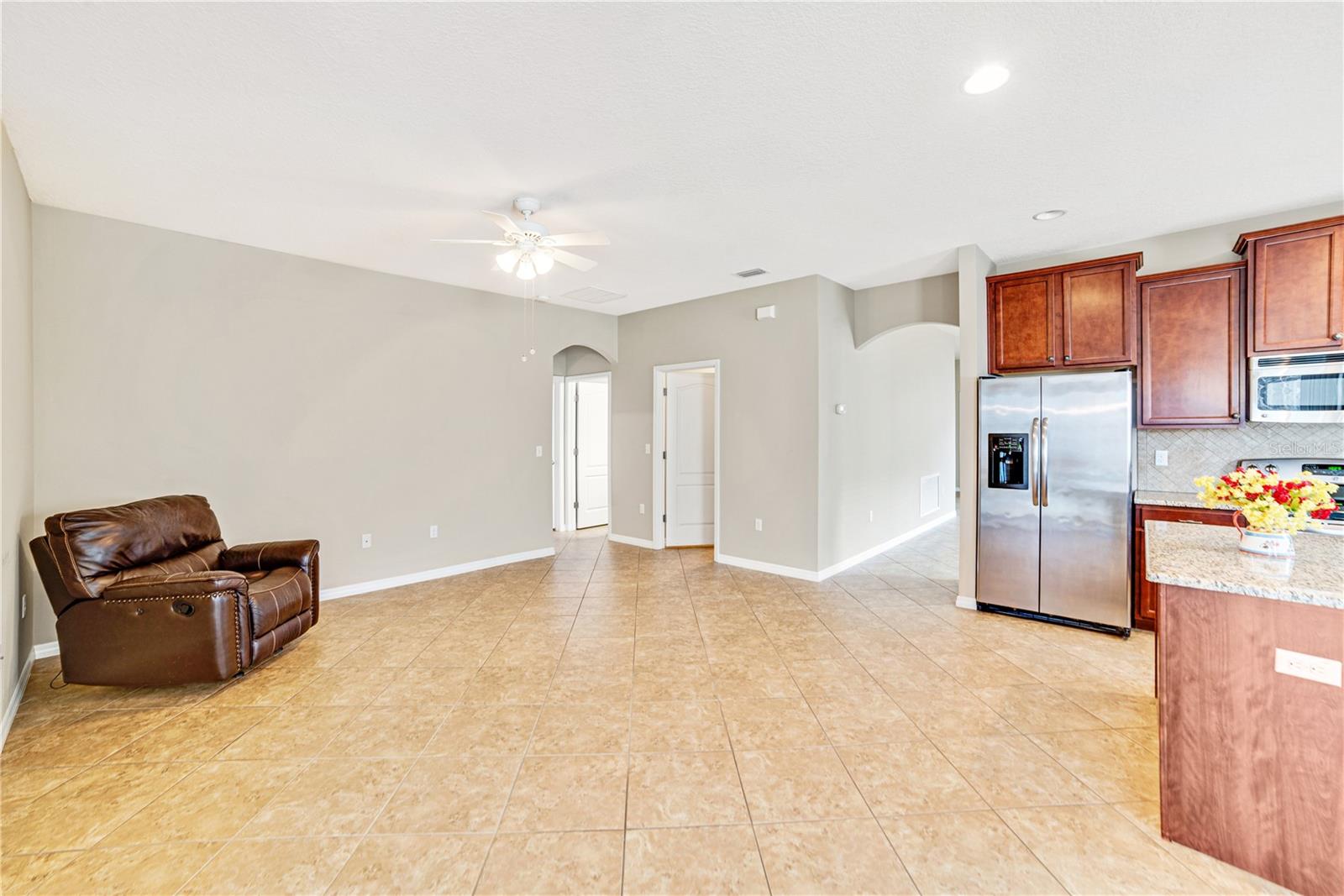 CEILING FAN IS ALREADY INSTALLED.  LAUNDRY ROOM AND EXIT TO GARAGE IS CONVENIENTLY SITUATED IN THE FAMILY AREA