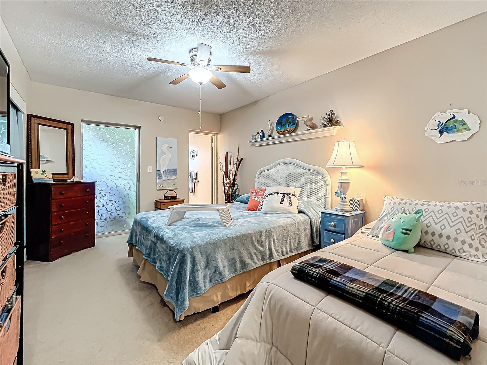 Ensuite bathroom features walk-in shower.