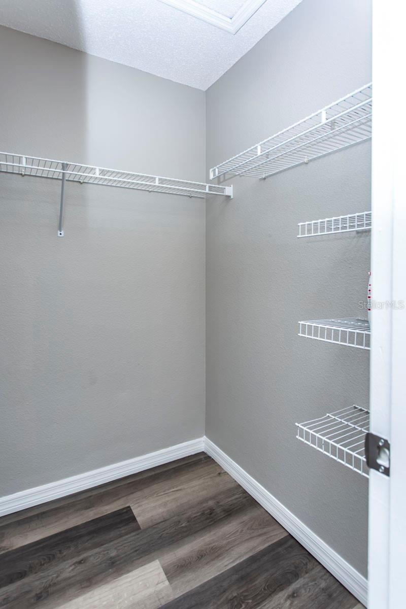 Primary walk-in Closet (one of them)