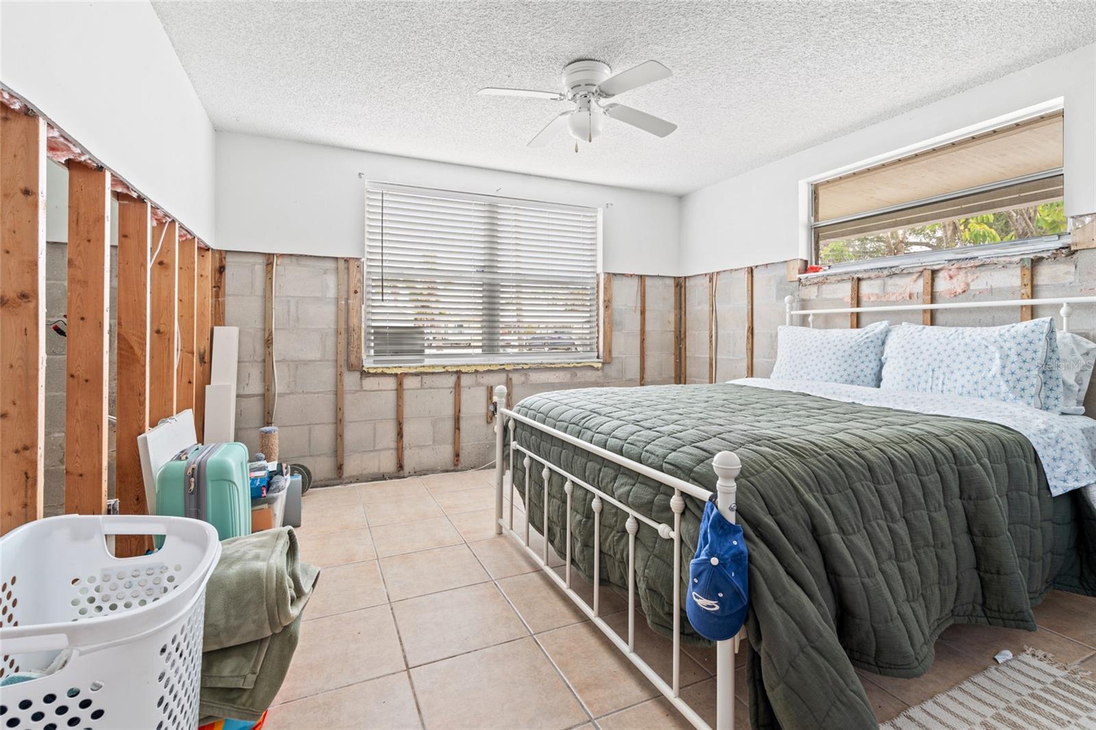 primary bedroom with built-in closet