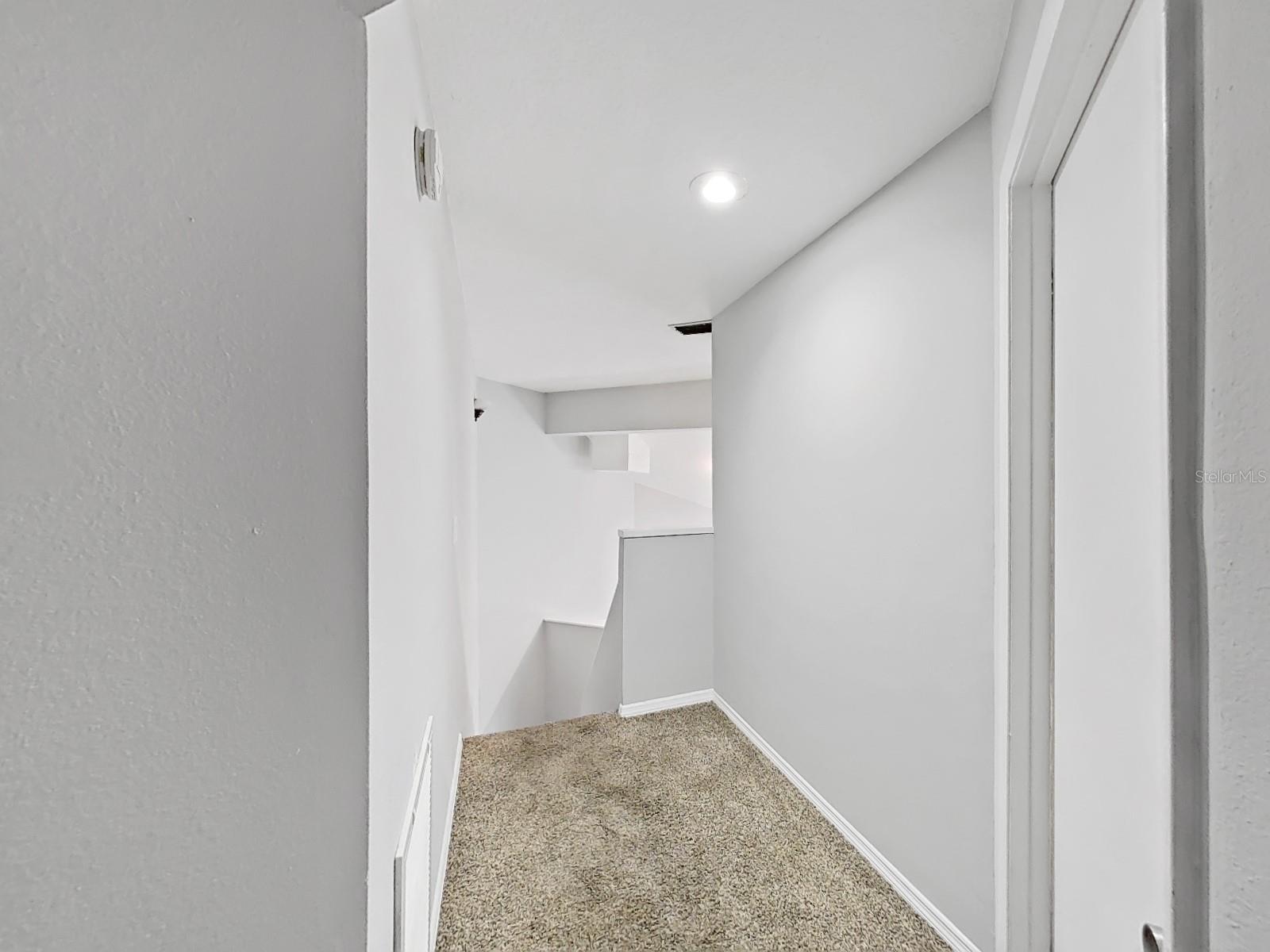 Second floor view towards staircase.