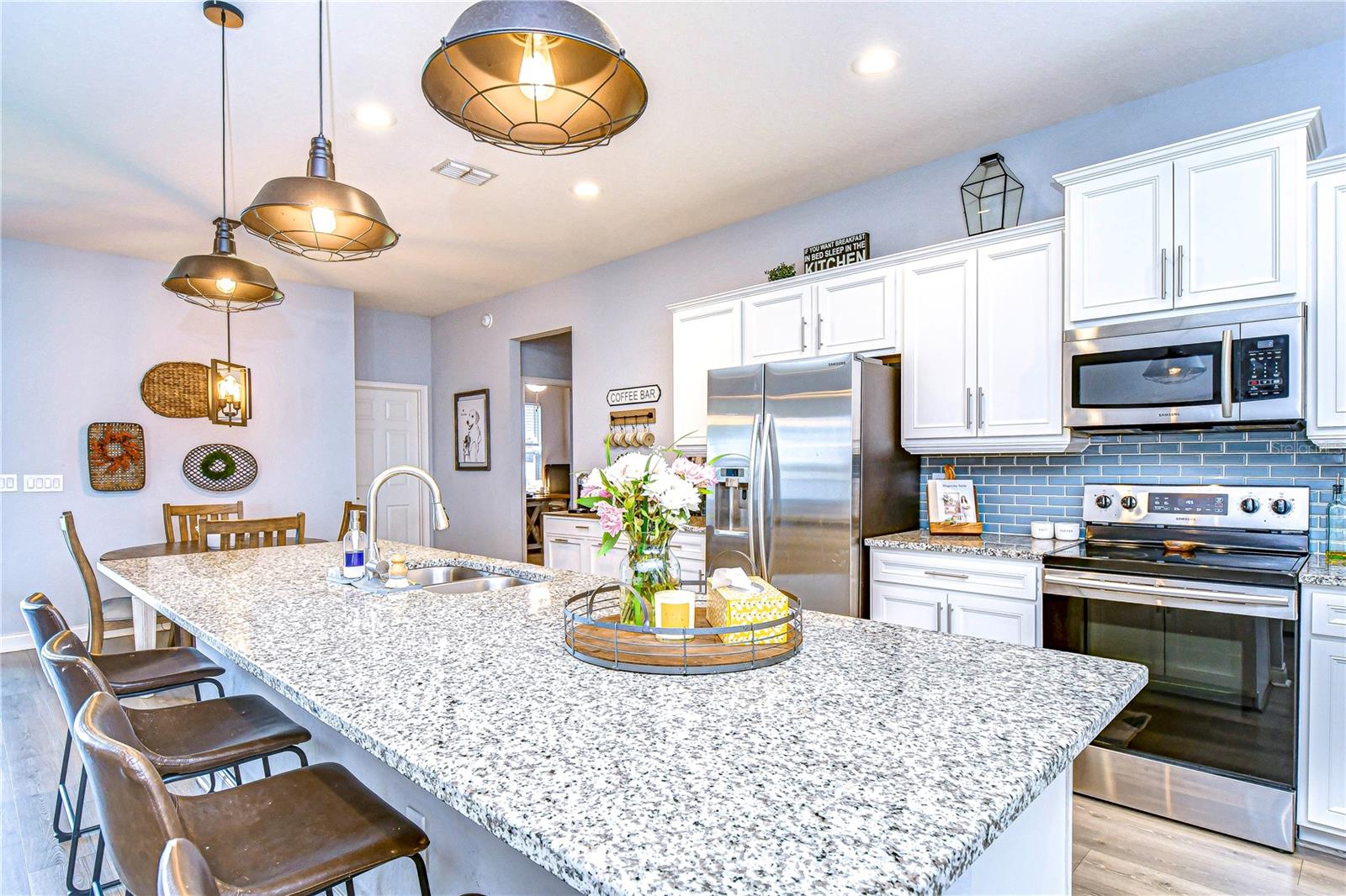 Lengthy breakfast bar offers a great space to entertain.