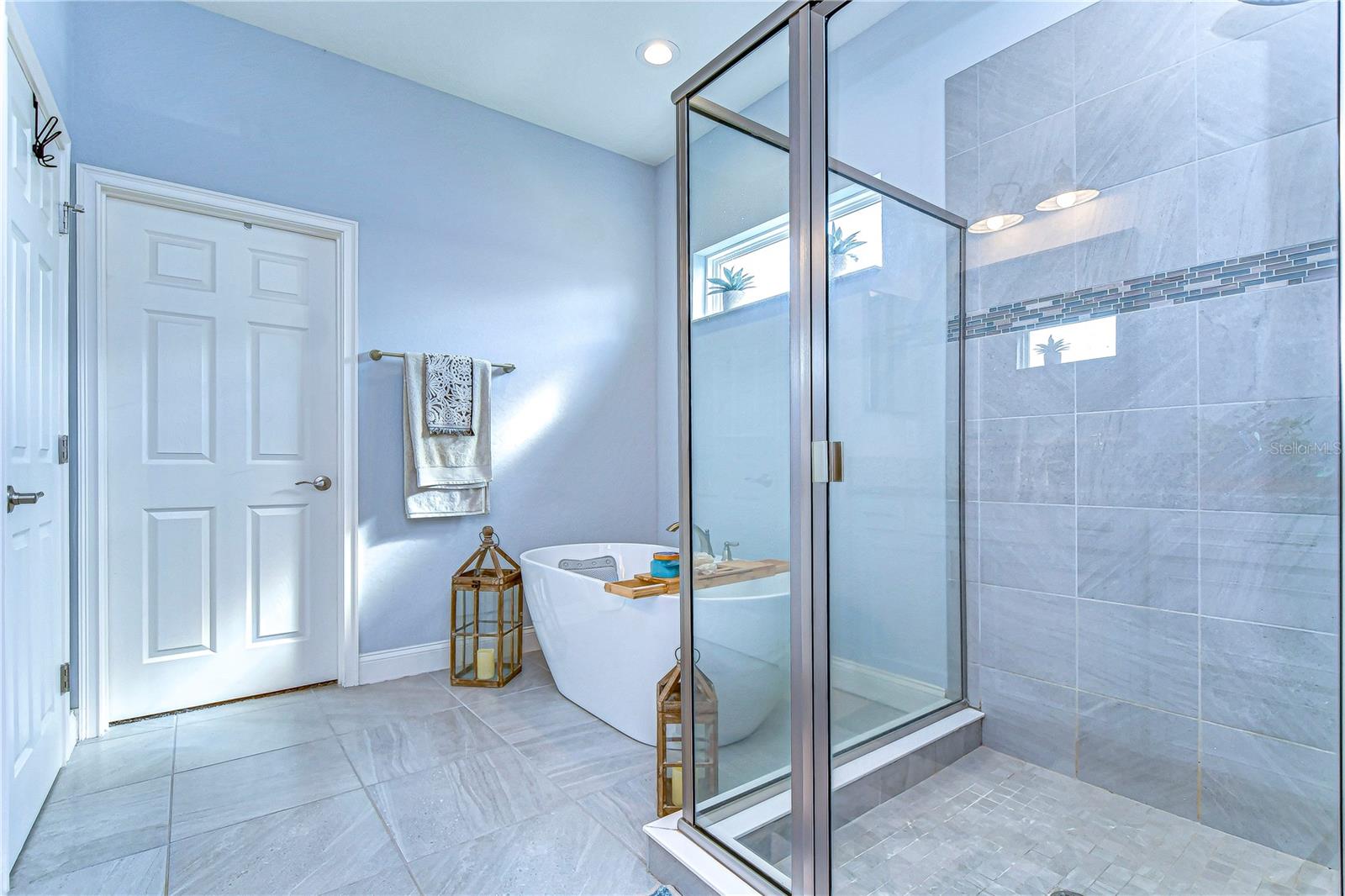 Stand alone soaking tub and large walk in shower!