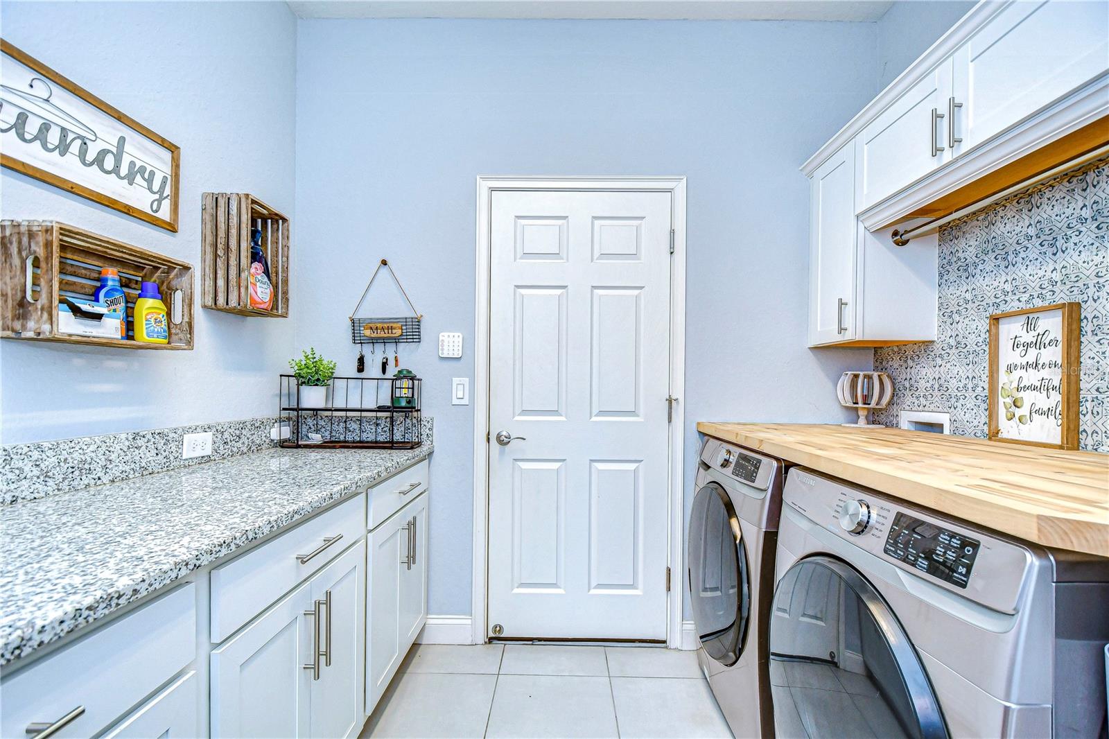 HUGE laundry room with separate counter space!