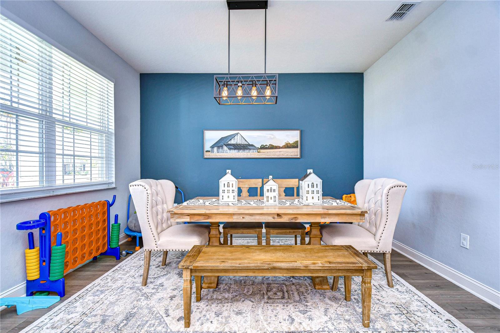 Spacious dining room bursting with natural light!