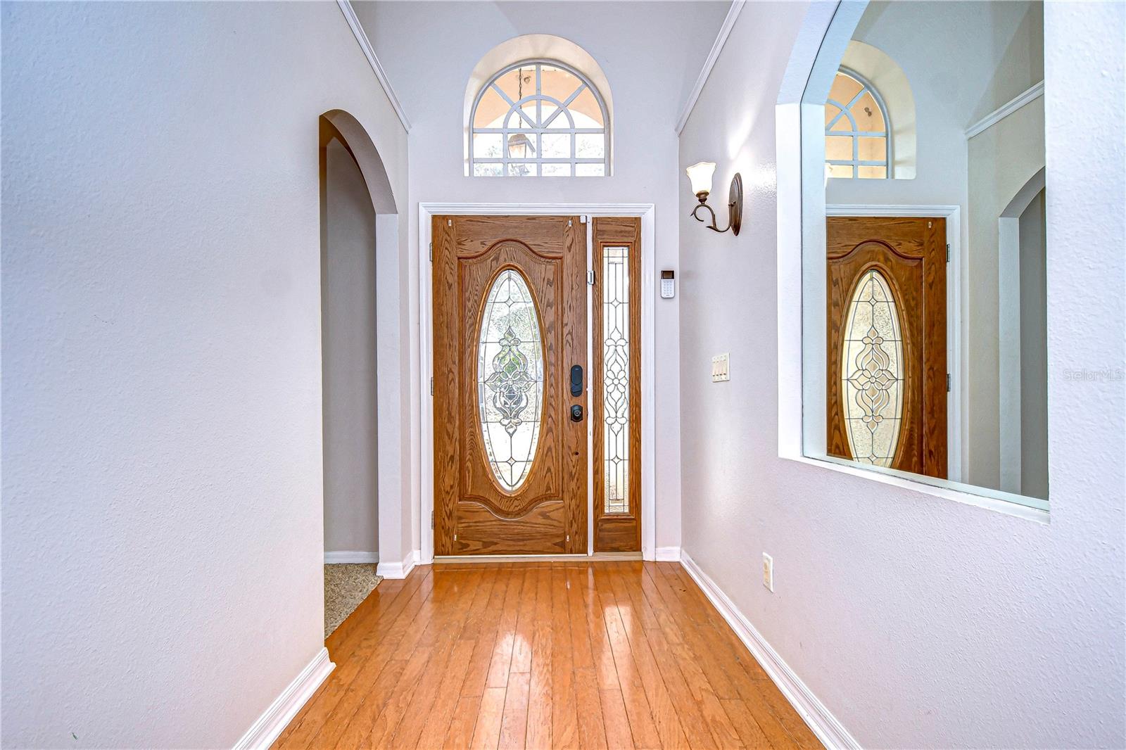 Enter through the foyer with raised ceilings!