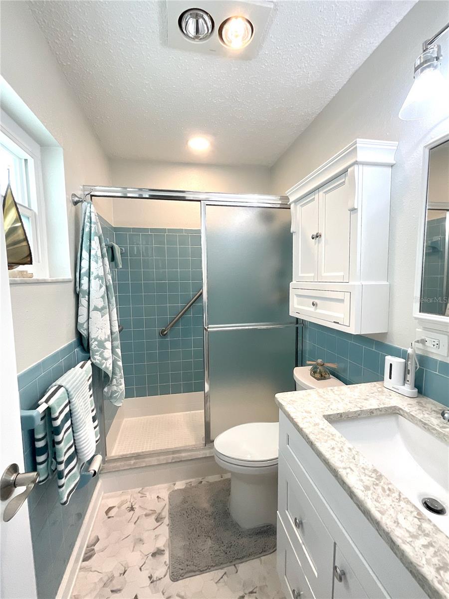 38-Primary bedroom bathroom with step in shower