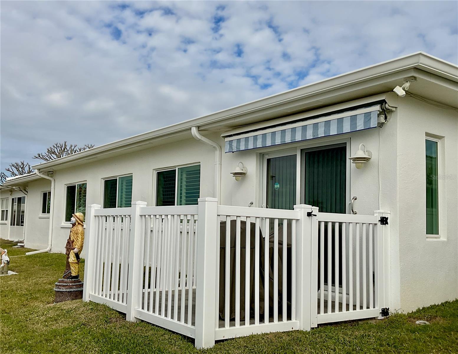 42-Fenced patio with motorized awning