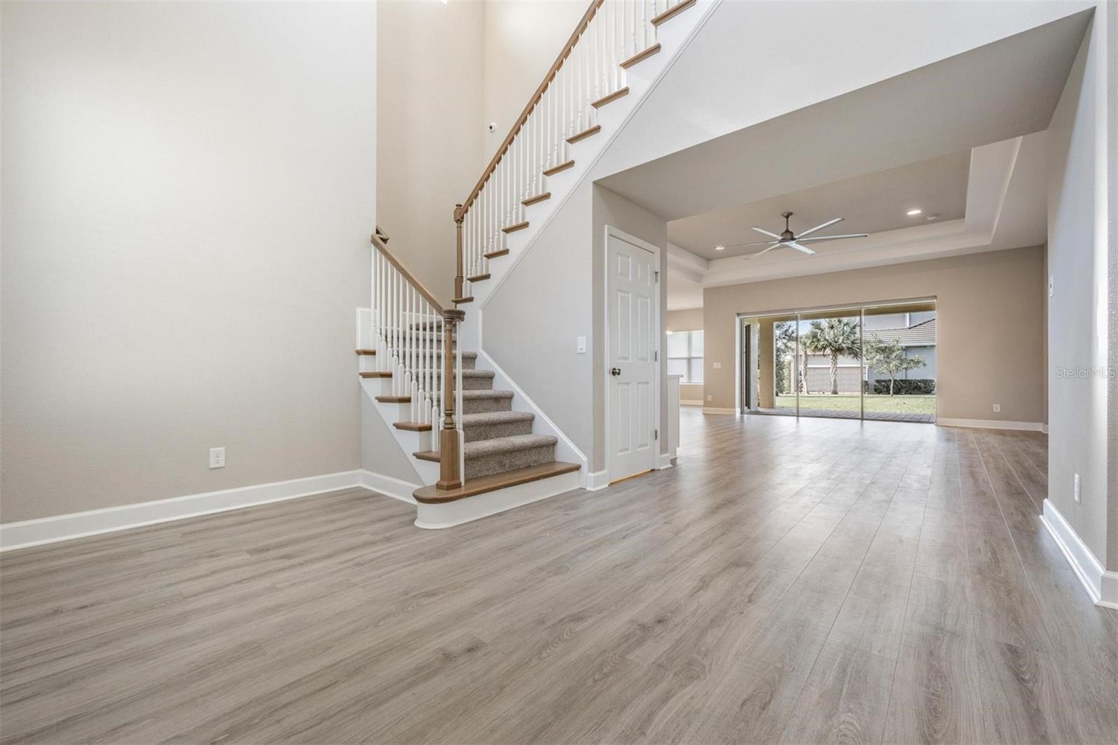 Entry with grand ceilings and tons of natural light