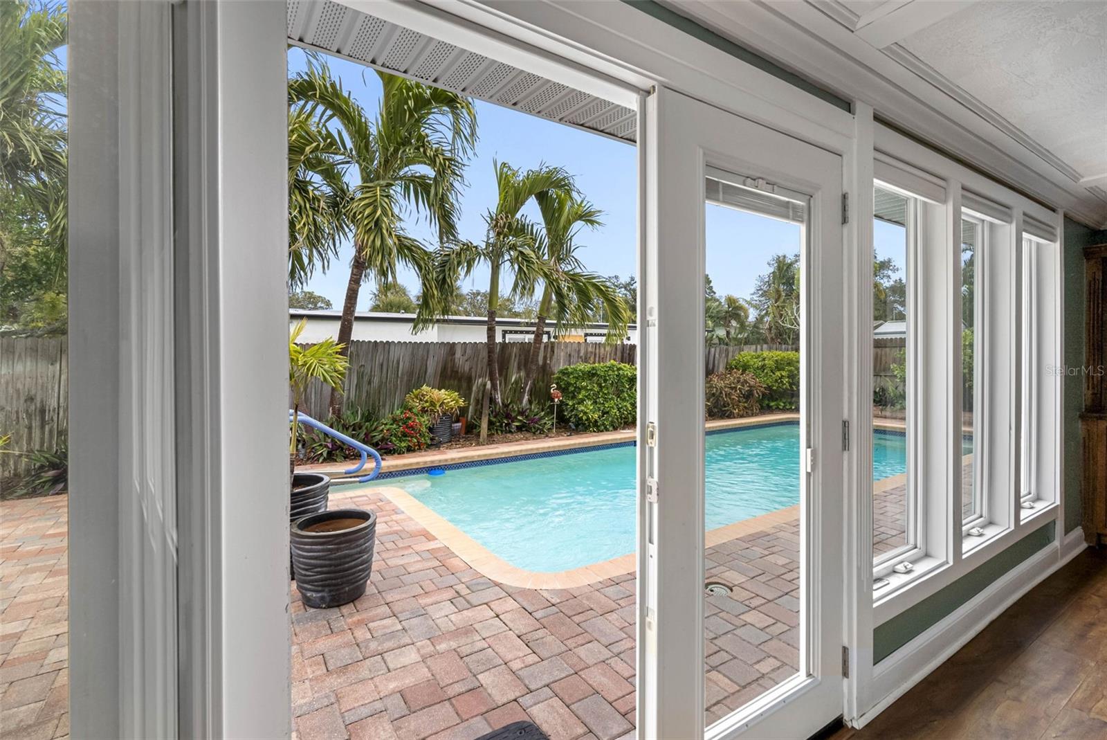 Pool views through new windows and doors.