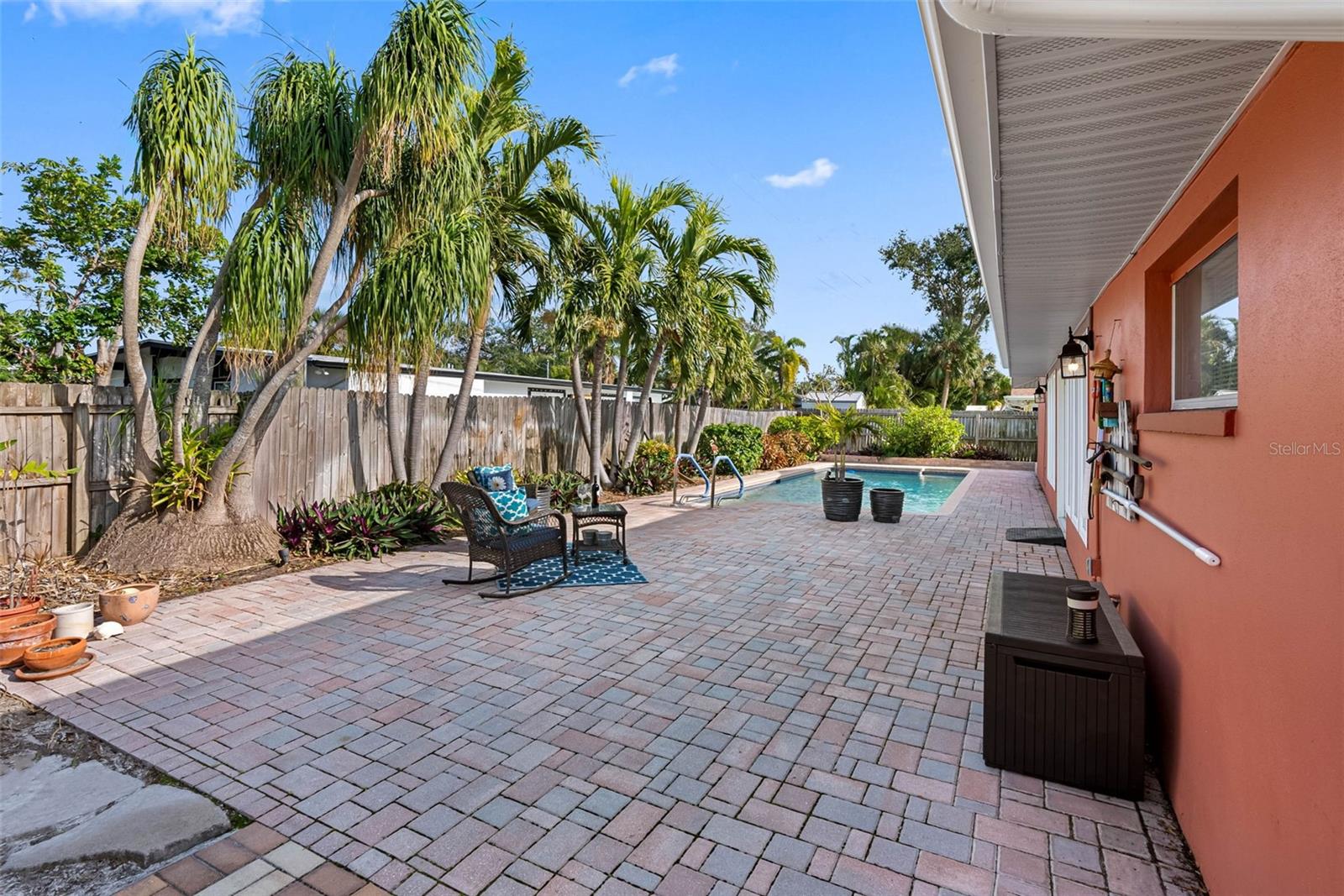 Fully fenced backyard with space for pets, play, or future outdoor kitchen dreams.