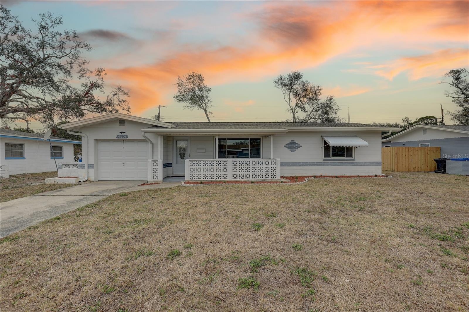 Solid block home with NEW Roof & double pane windows