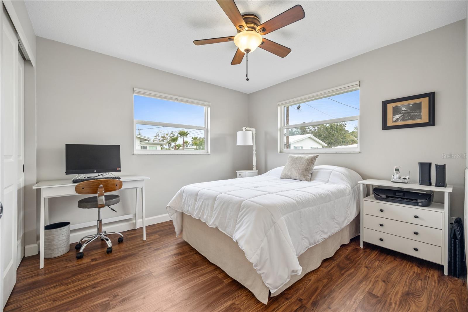 The guest bedroom also has 2 windows and 2 closets.