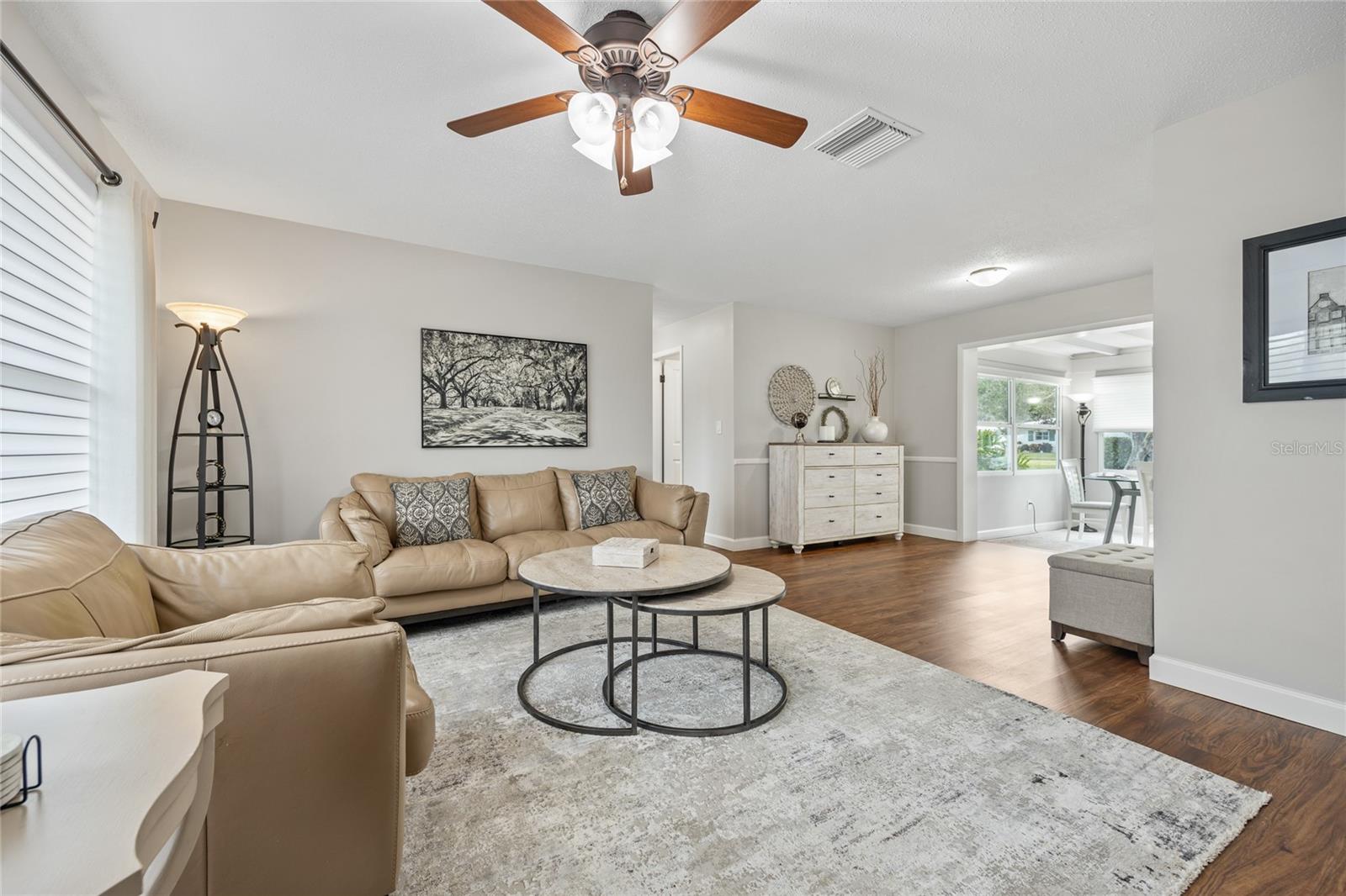 This fantastic home has been fully renovated inside and features beautiful Luxury Vinyl Plank flooring throughout.    This is your view as you enter the home of the Living Room.