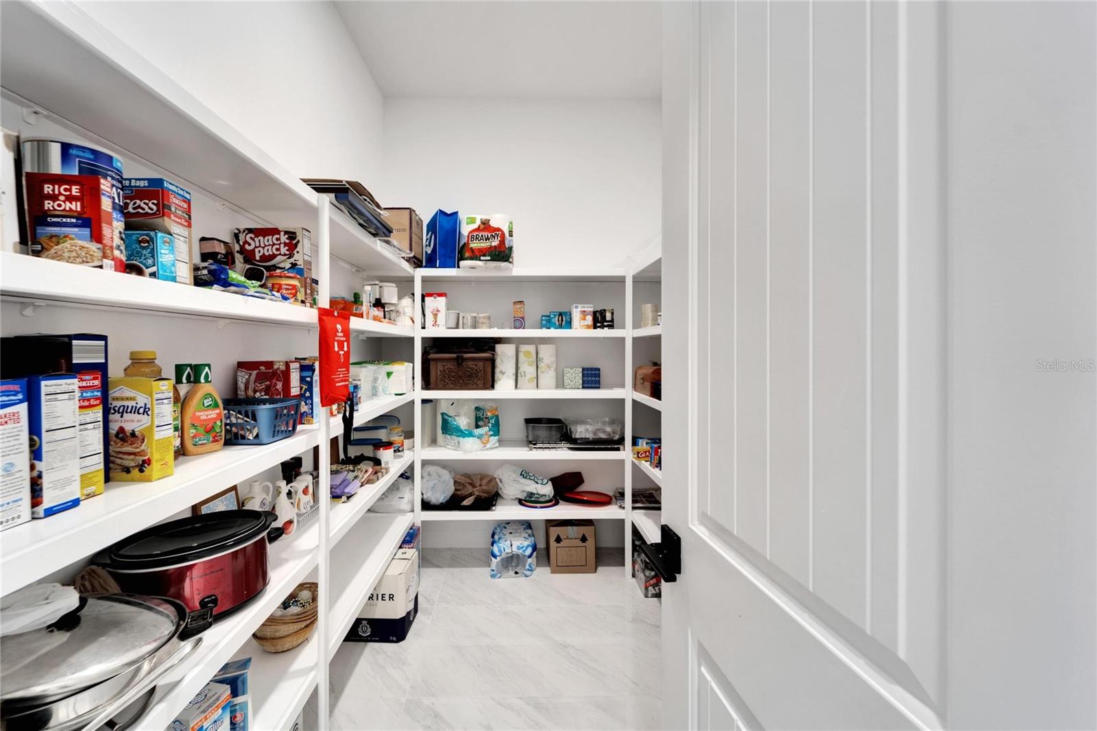 Kitchen with enormous walk-in pantry