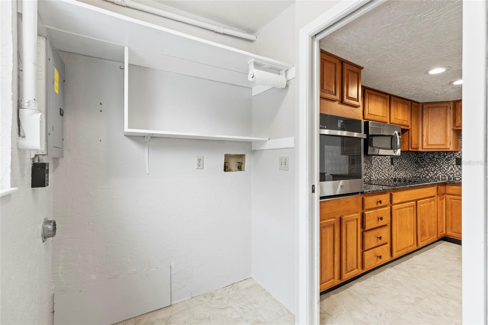 Laundry room off of kitchen