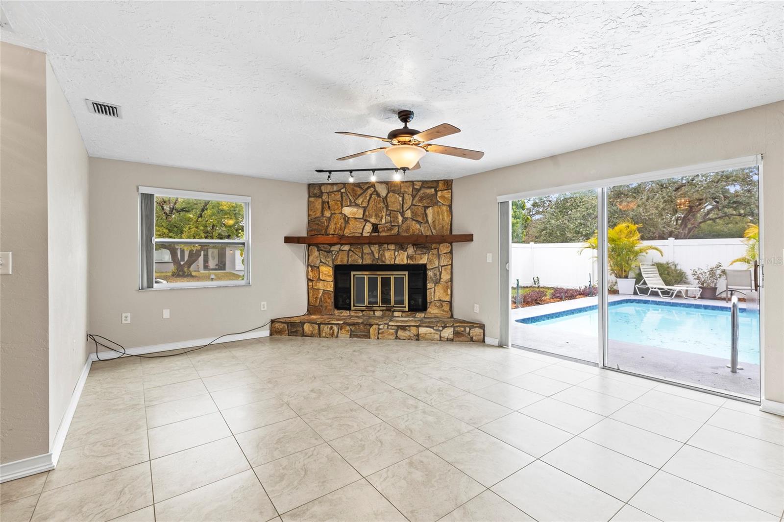 Family room with slider to pool