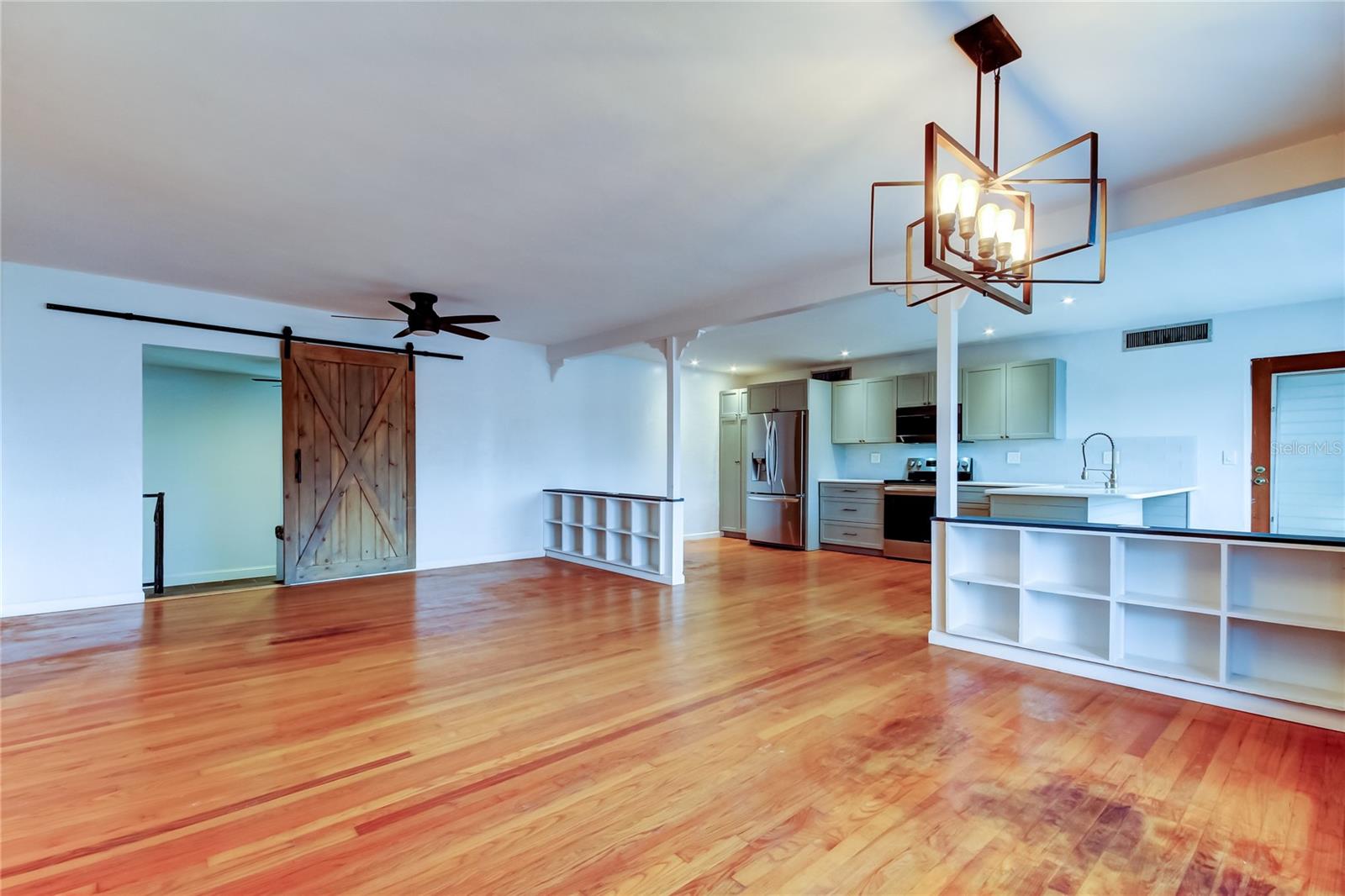 Kitchen opens to Great Room.  Note storage/bookshelves.