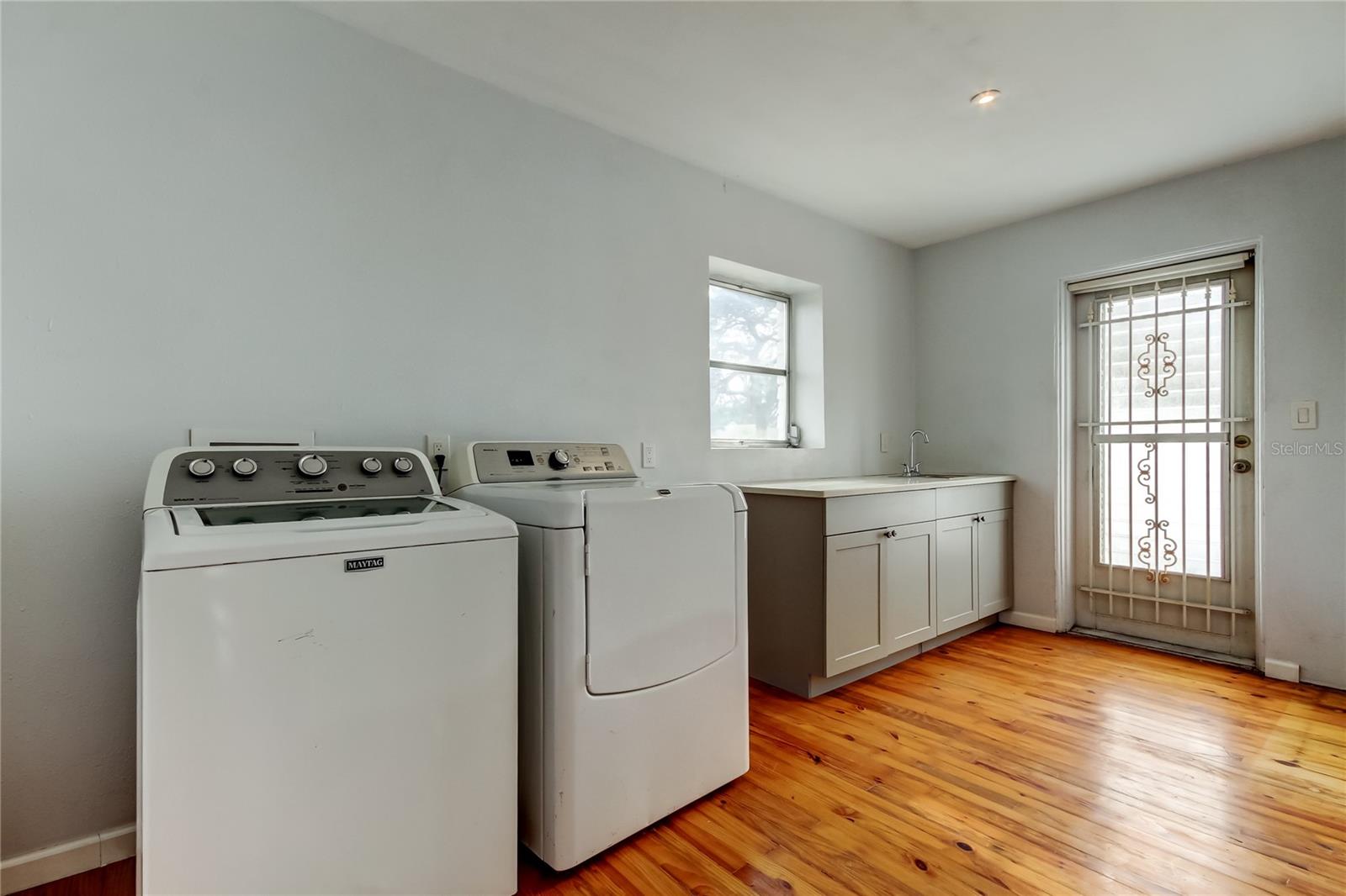 From spacious Laundry Room, you can step outside to a patio to enjoy your morning coffee.