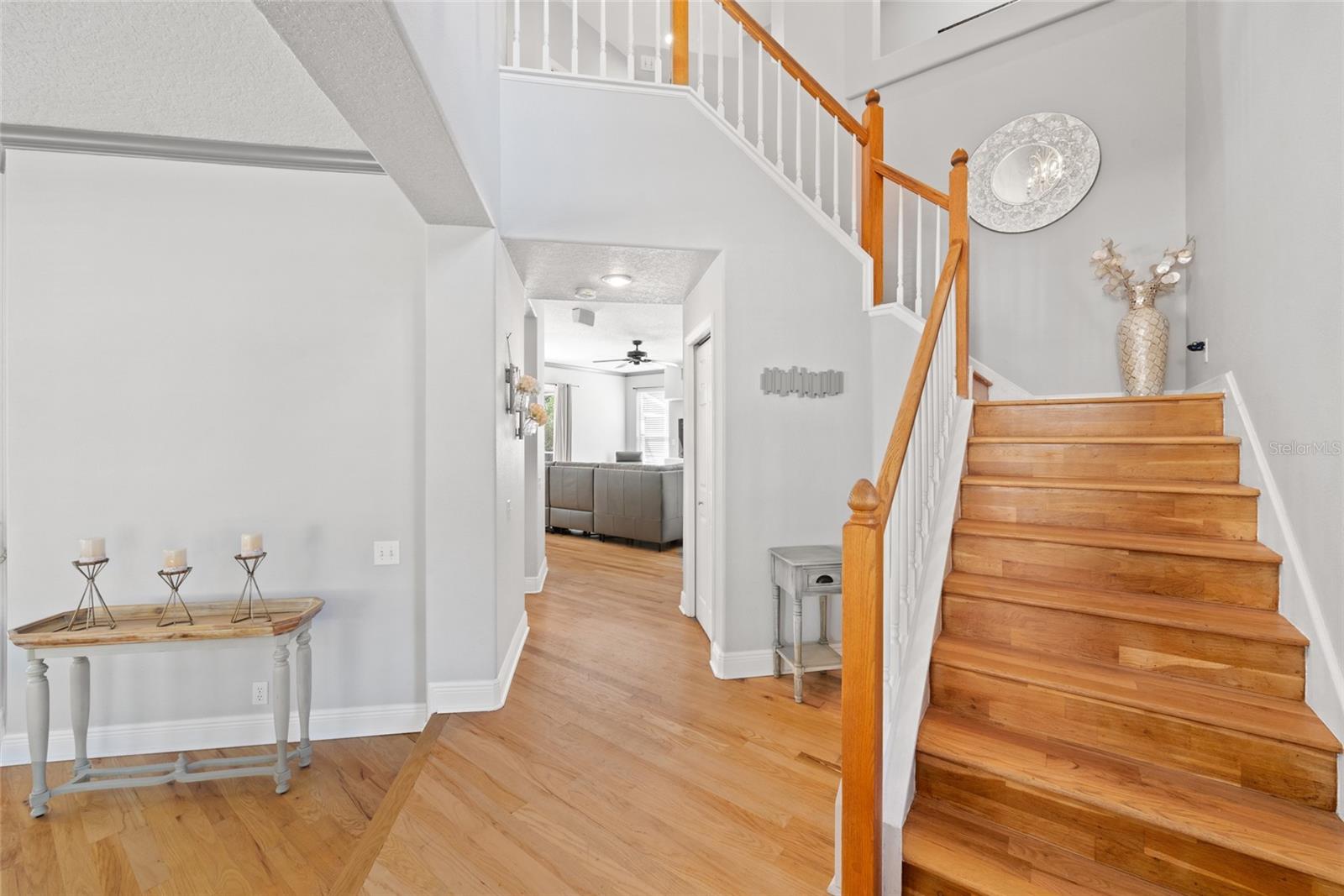 ENTRANCE TO KITCHEN AND UPSTAIRS