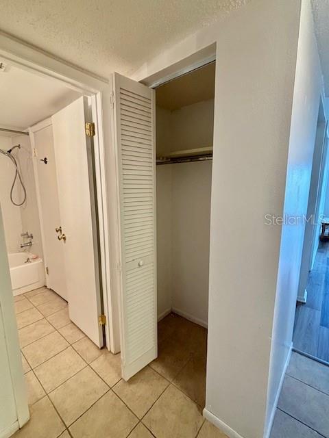 Closet leading into Bath from Bedroom