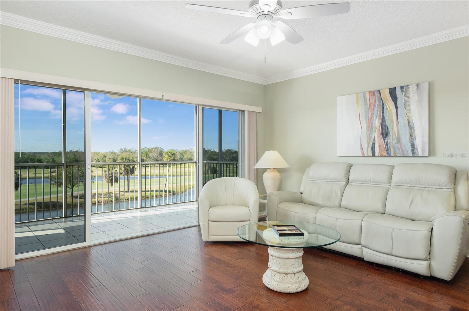 Western views, lake, and East Bay Golf Course. Relax in the covered screened Florida Room. Nature abounds!