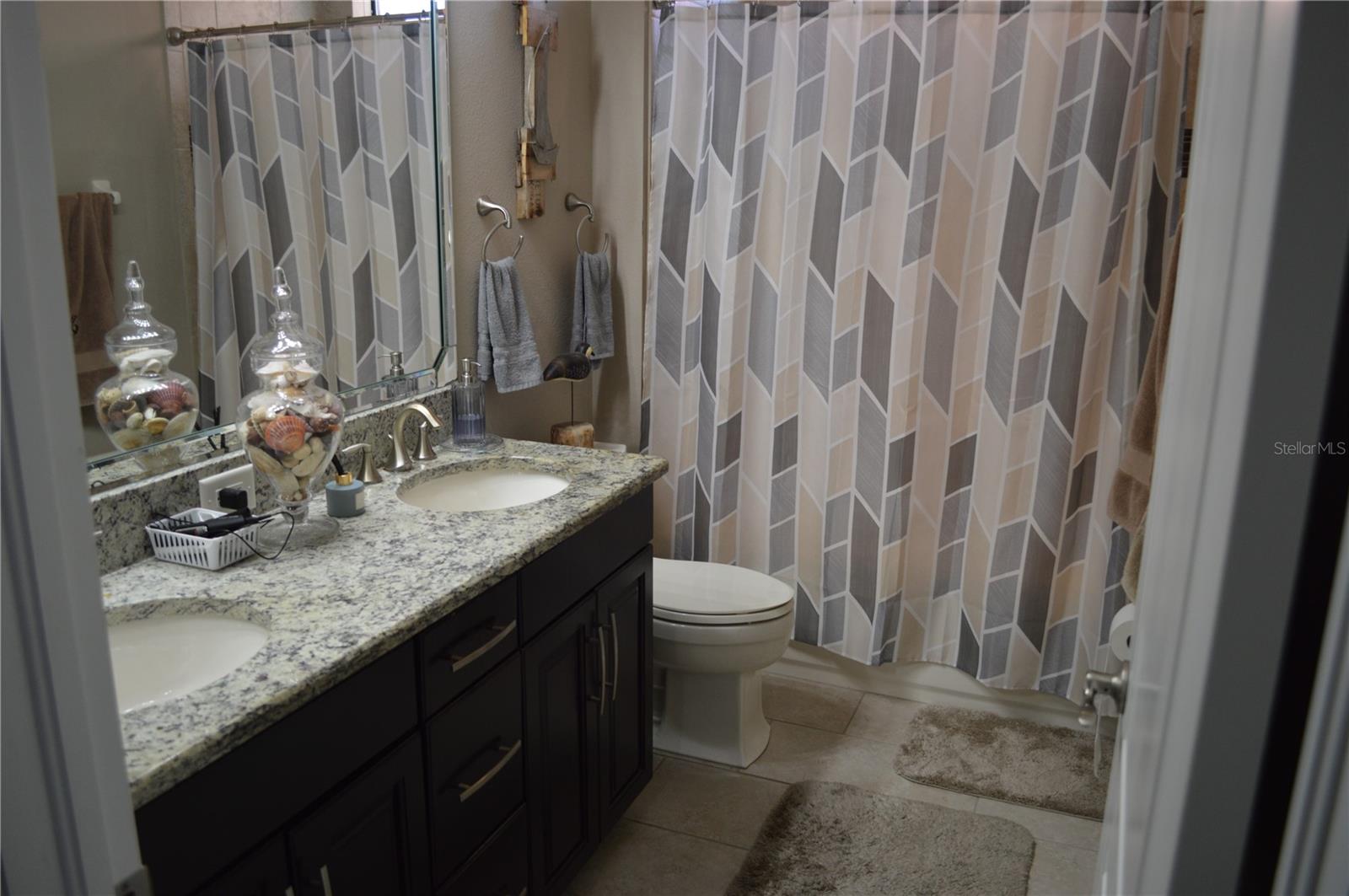 First bathroom in the hallway used by the first two bedrooms.