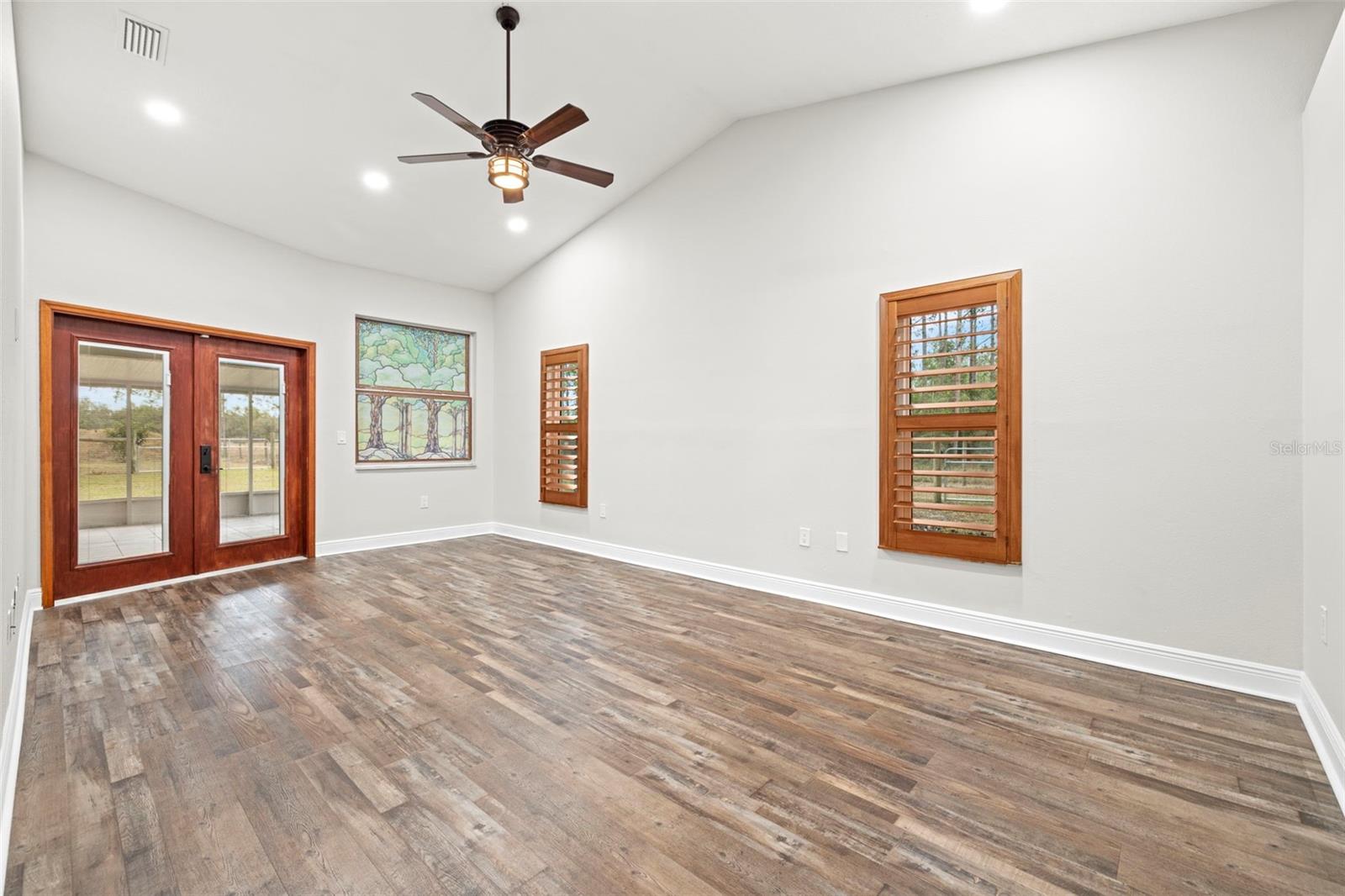 Primary Bedroom with access to back porch