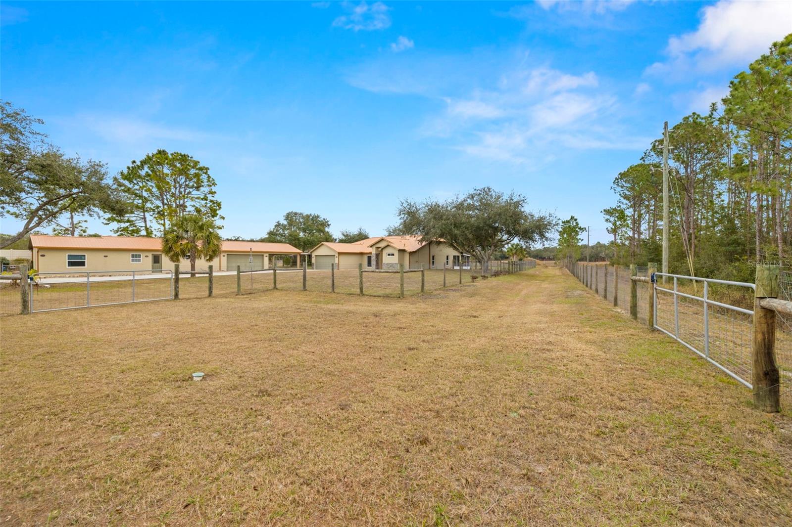 Fenced run from barn to back acreage