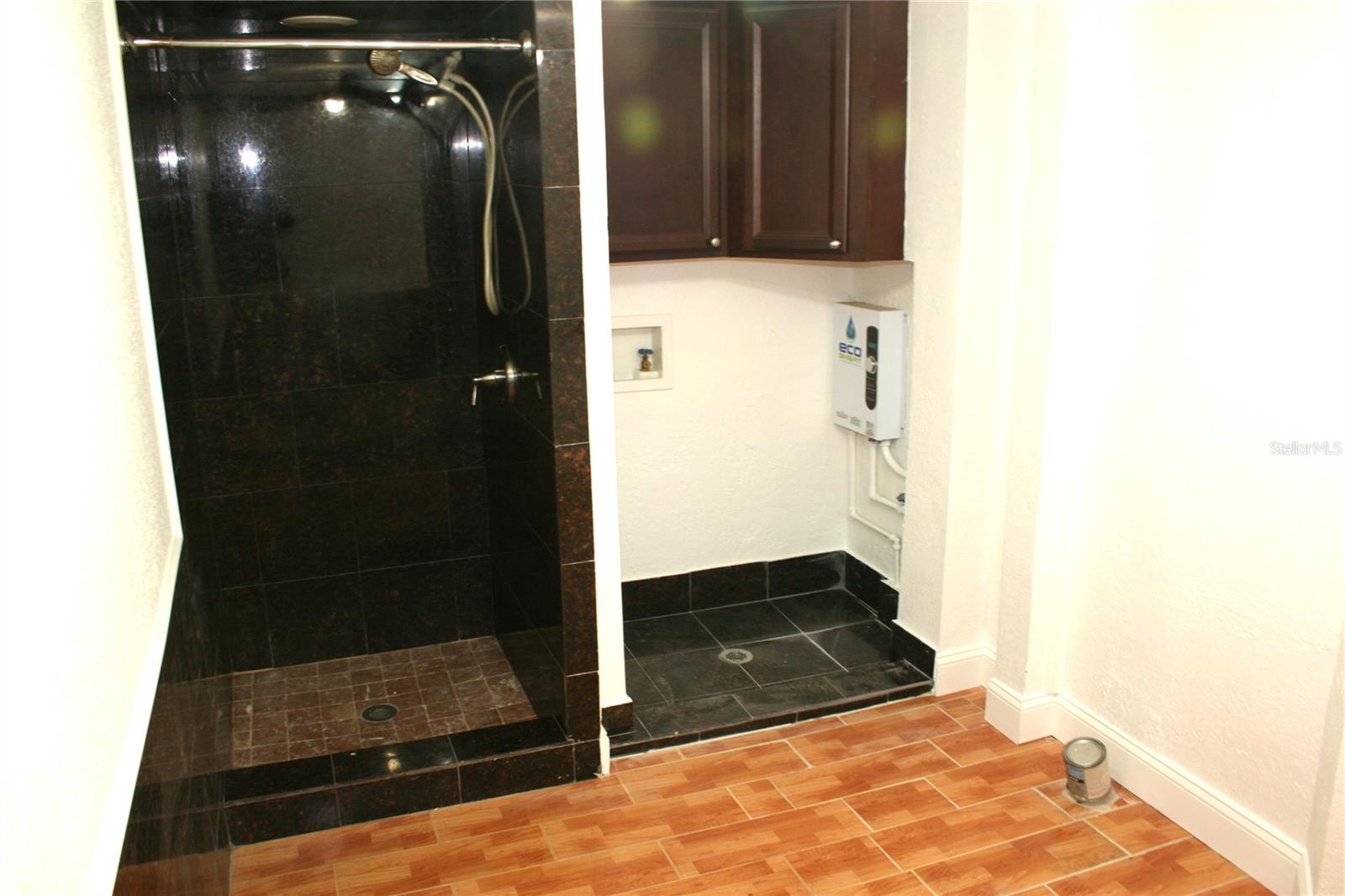 First Level Bathroom off Kitchen area w/ washer and dryer hook-up