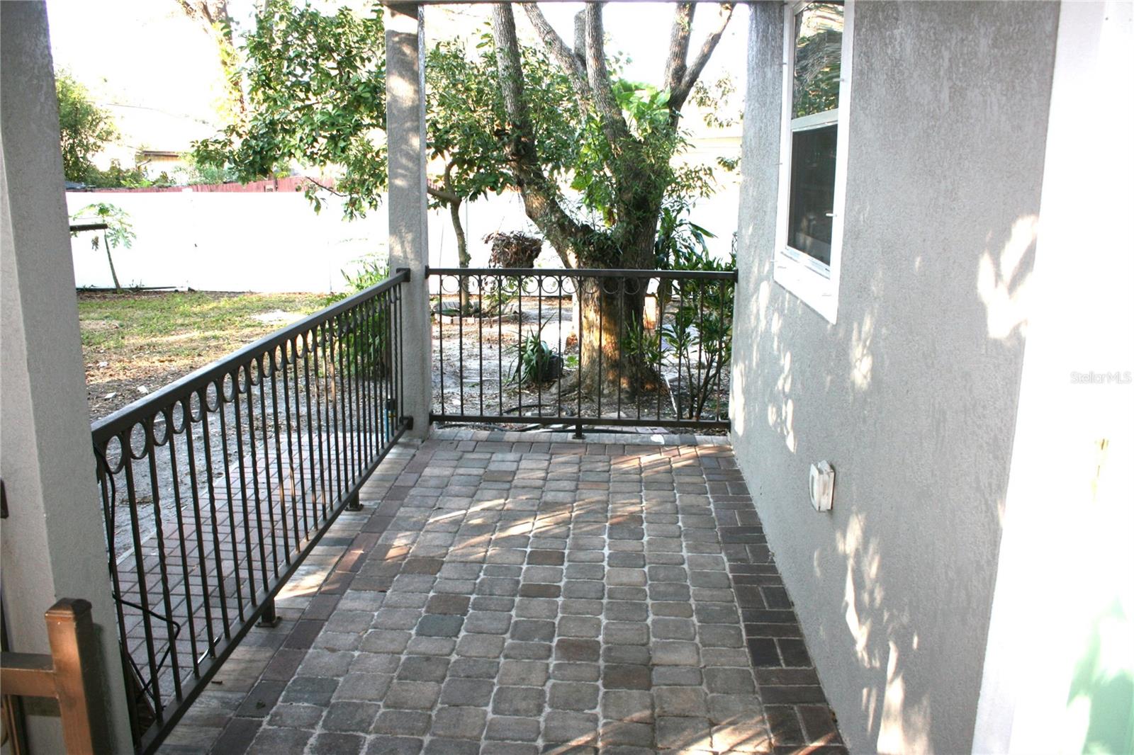 Covered rear Patio off Formal dining/family room