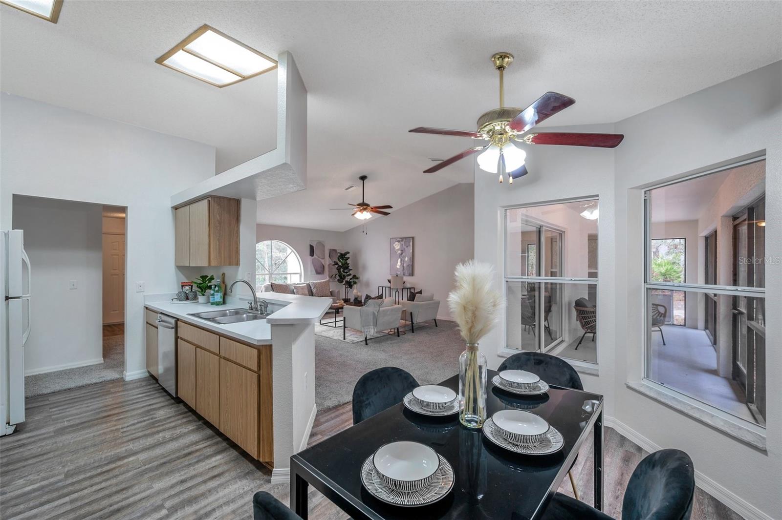 Looking into the Kitchen and Living Room from the Dining Area