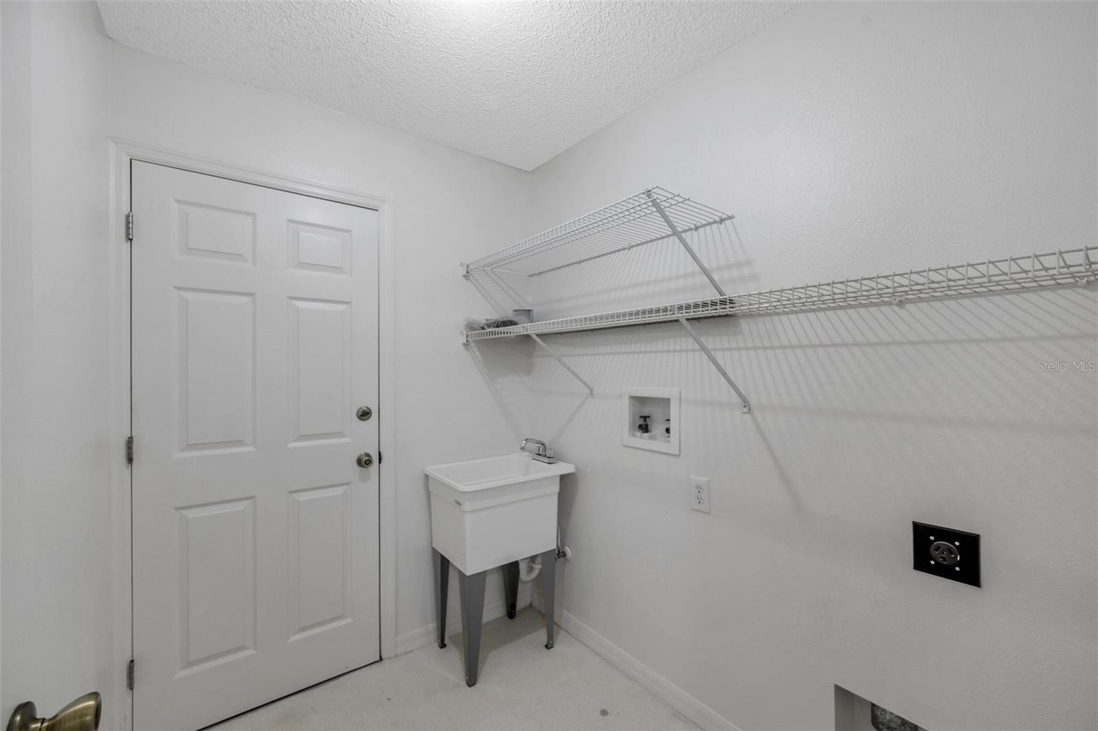 In-home Laundry Room with new utility sink.