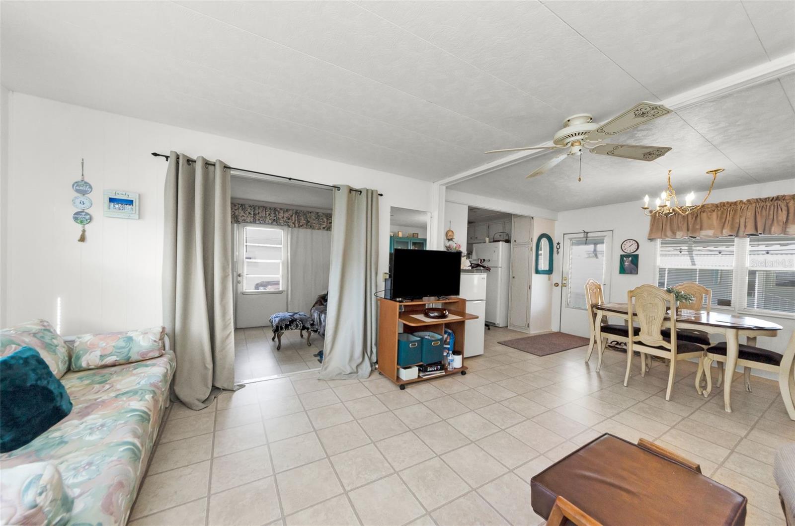 Living Room view of the Florida Room and Kitchen