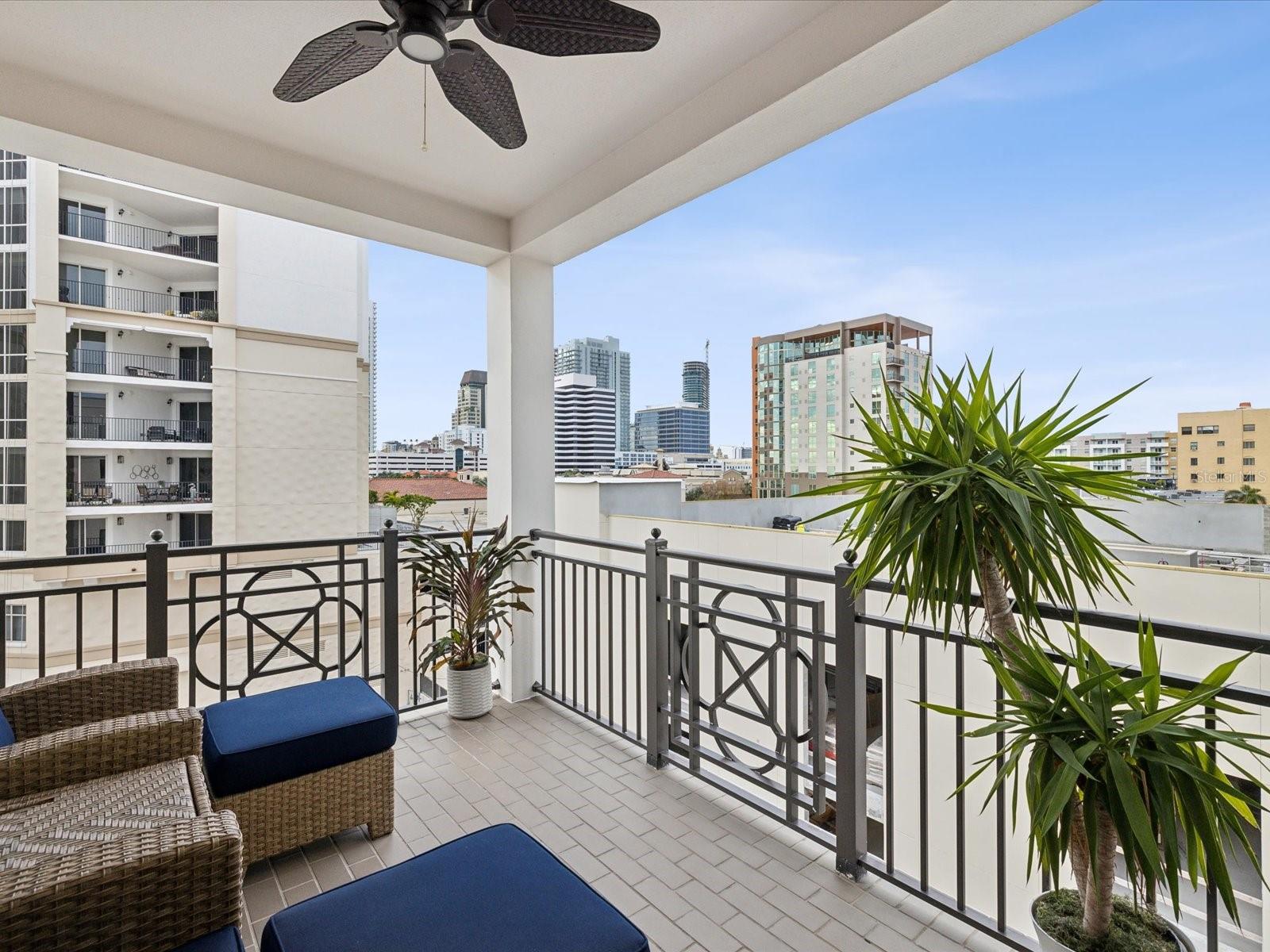 Covered balcony with views of the city and Tampa Bay