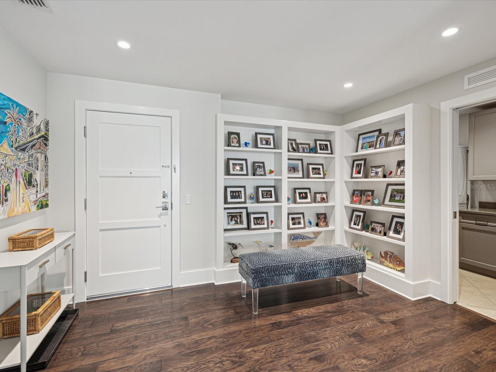 Foyer/Library with built-in shelving