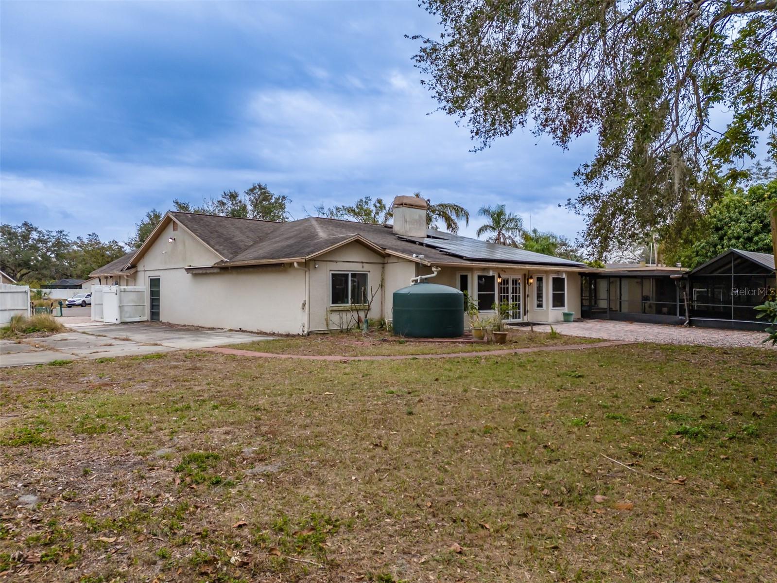 4228 Spring Way Circle, Valrico, Fl 33596 - Side/rear view.  Additional parking pad