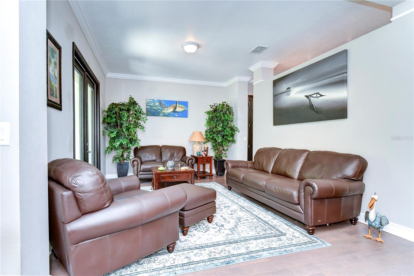 Formal living room offers crown molding!