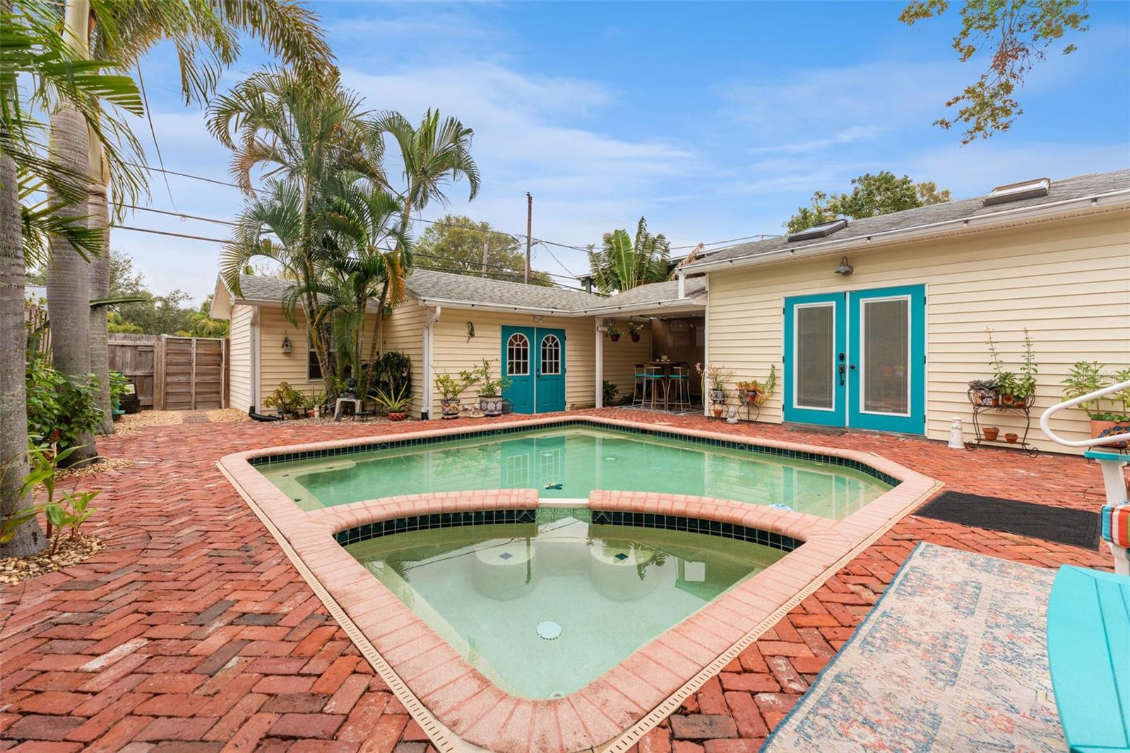 gas heated salt water pool.  The studio is to the right with the garage at the rear