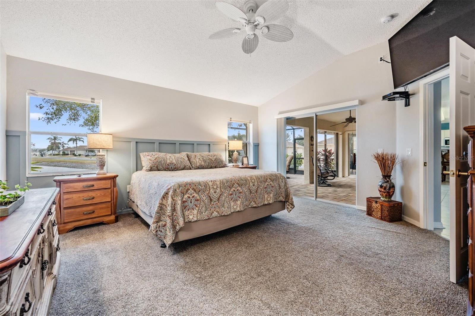 Vaulted ceilings and sliding glass door to lanai for an open and airy feeling