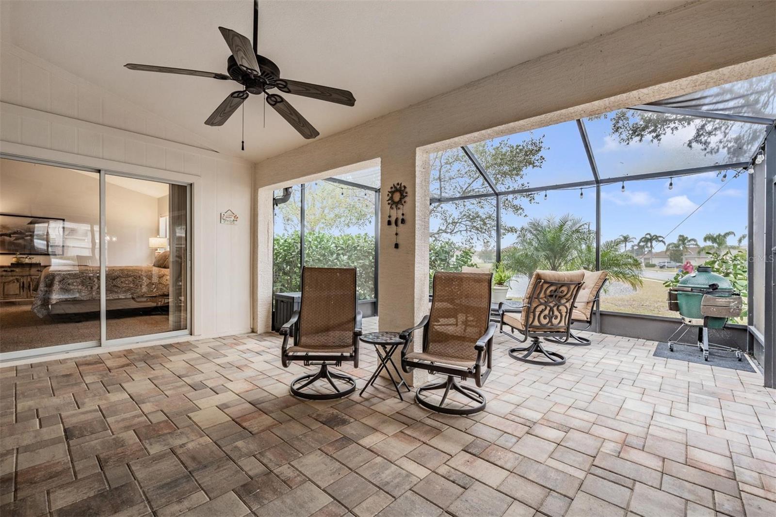 Large, covered area with pavers extending to the exterior area