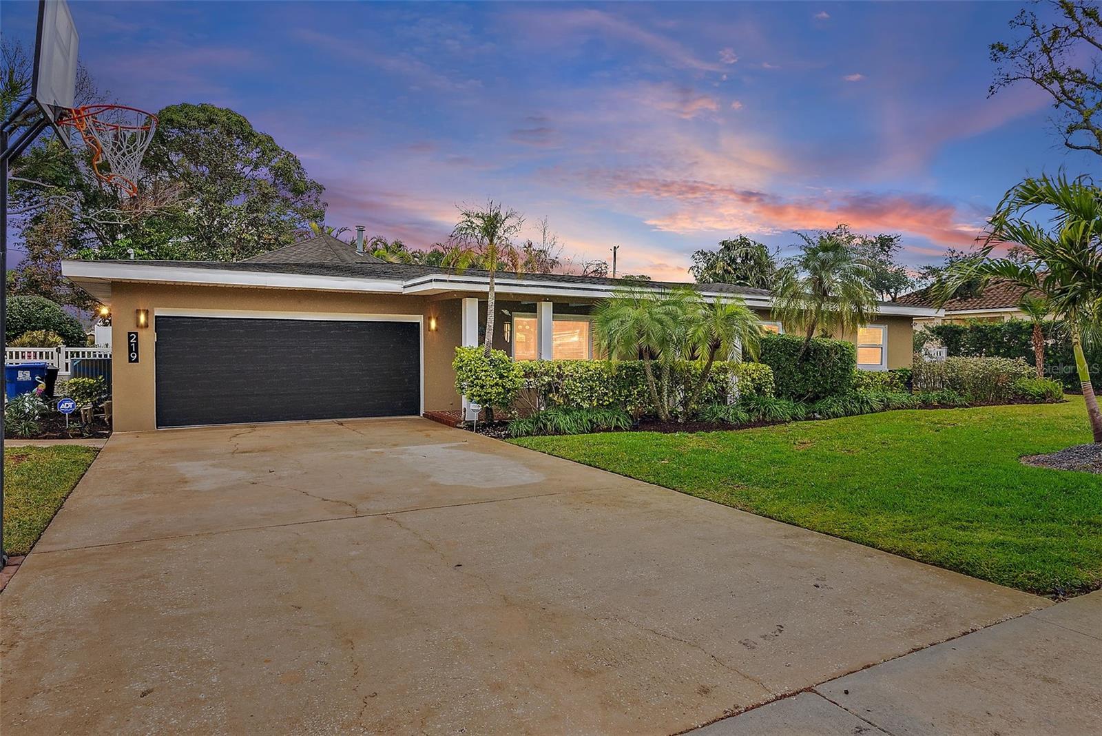 Front of home at Twilight (Large Driveway extra parking!)